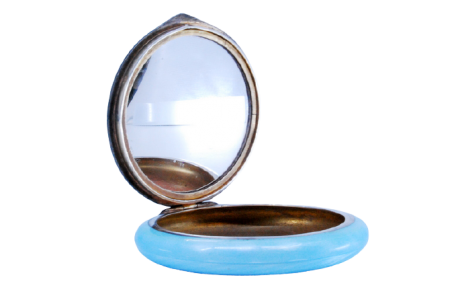 Caixa de toilette em prata e esmalte azul de forma circular com espelho no interior.